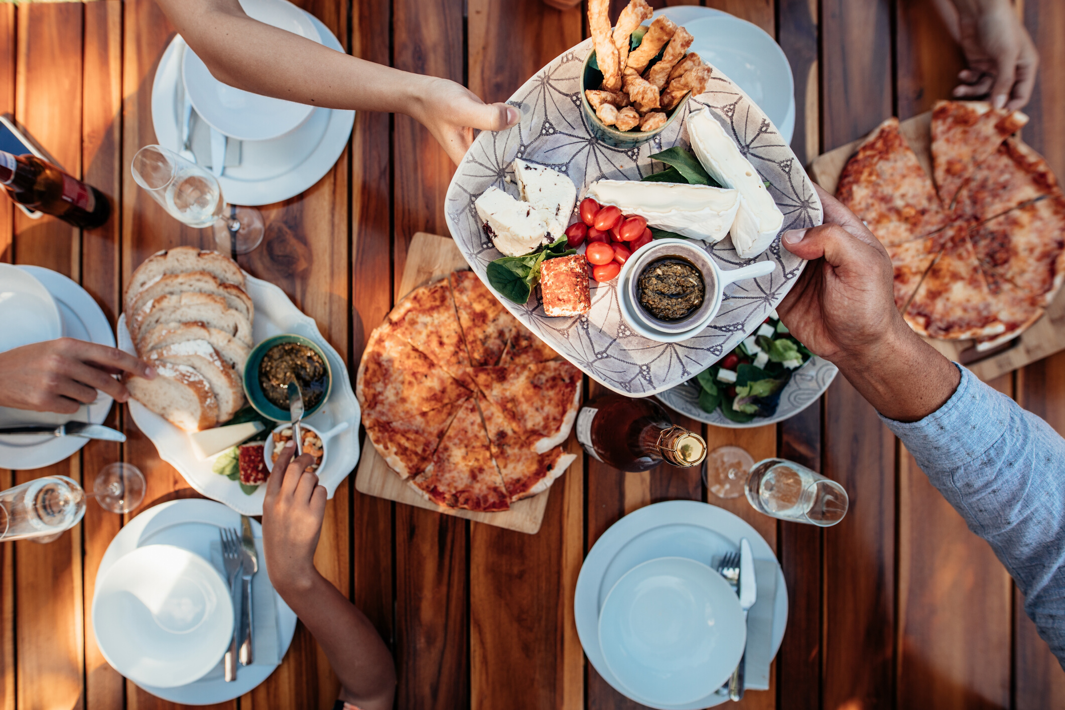People Eating Meal at Table 